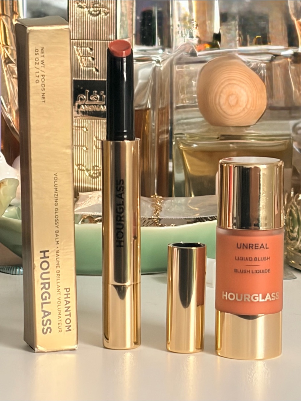 Hourglass Phantom Volumizing Lip Gloss in Slip & Unreal Liquid Blush in Moment